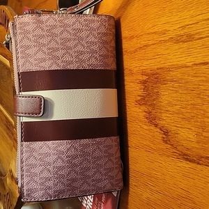 Michael Kors wristlet, plum color